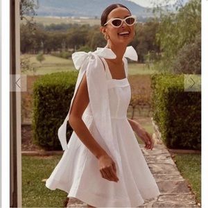 AISLE WHITE LINEN BOW MINI DRESS DISSH